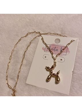 Paperclip chain with Balloon dog gold pendant.